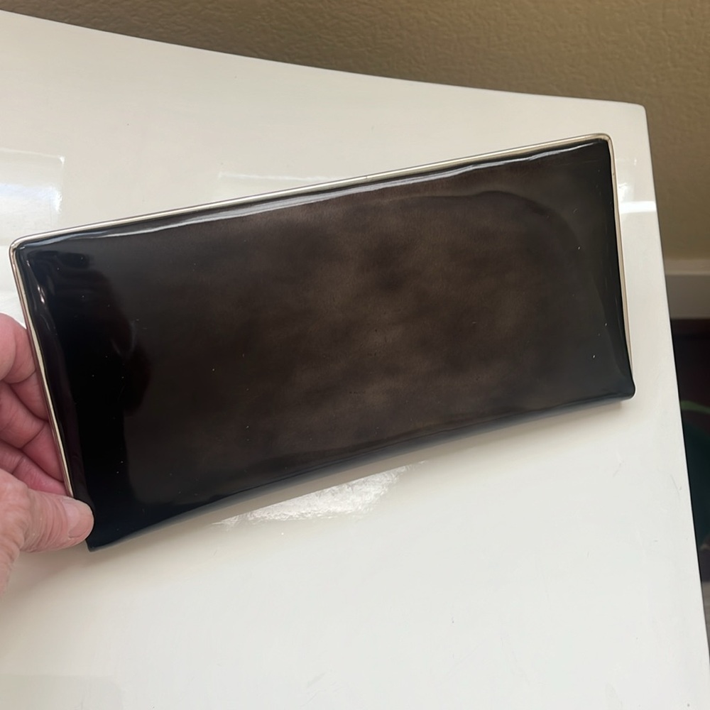 Envelope brown paten with silver metal case credit card holder snd zip packet
